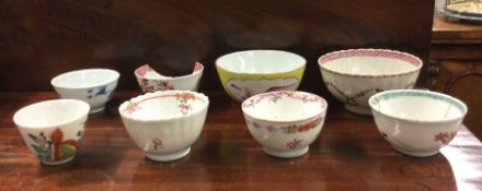 A group of eight Chinese tea bowls.