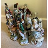A collection of pottery figures.