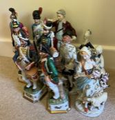 A collection of pottery figures.