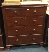 A Victorian chest of five drawers.