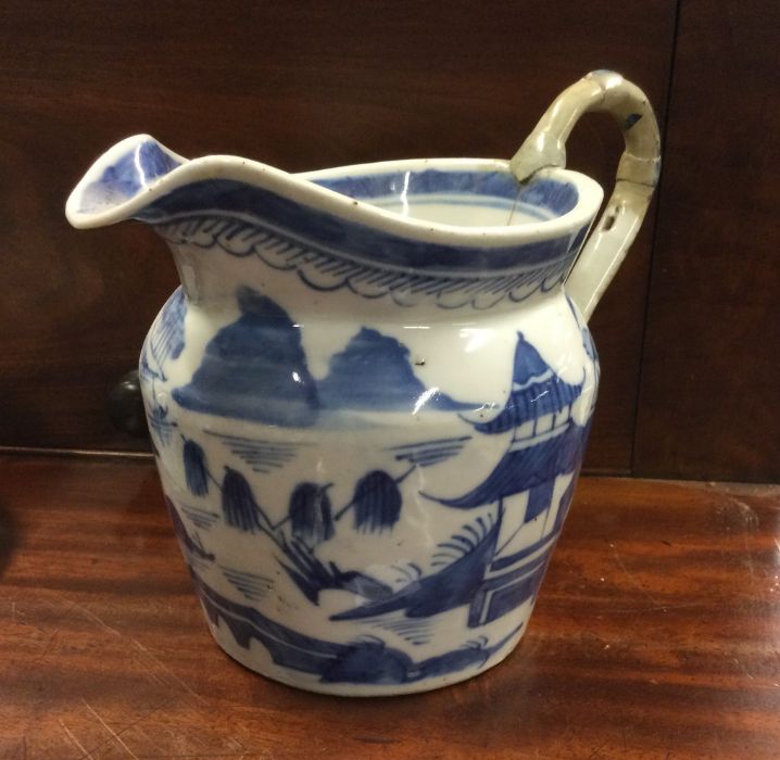 A large Chinese blue and white jug. - Image 2 of 3