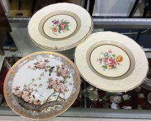 Three creamware plates together with a Japanese pl