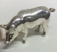 A modern silver cast figure of a pig. Approx. 21 g