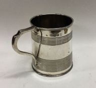 A George III silver reeded mug. London 1808. Appro