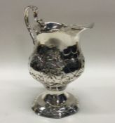 A good Georgian silver helmet shaped cream jug. Lo