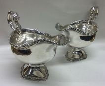 A heavy and finely cast George III pair of silver