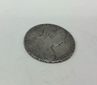 A heavy Austrian silver coin dated 1780. Approx. 2
