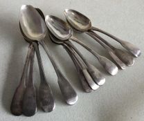 A heavy set of seven fiddle pattern silver dessert