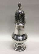 A heavy Georgian style silver sugar caster. London