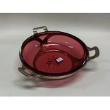 A silver and cranberry glass sweet dish of circula