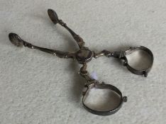 A pair of early Georgian silver sugar scissors. Lo