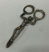 A Georgian pair of silver pierced ice tongs. Appro