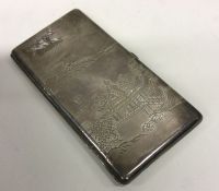 A large Japanese cigarette case engraved with temp