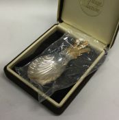 OF ROYAL INTEREST: A rare cased silver gilt caddy