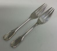 EMILE PUIFOCAT: A rare pair of silver forks. Appro