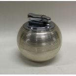 A heavy silver table witchball lighter. By Richard