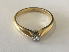 A good diamond single stone ring in 18 carat claw