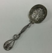 A silver cast Victorian caddy spoon of leaf form w