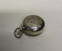 A heavy engraved silver sovereign case. Birmingham