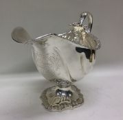 A rare George III silver sauce boat engraved with