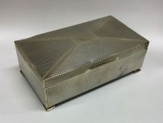 A silver mounted cigarette box of engine turned de