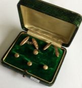 A cased set of gold cufflinks. Approx. 8 grams. Est