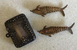 Two silver gilt articulated fish plus a silver ves