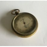 A gilt metal Barometer with silver dial. Est. £30