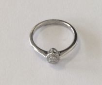 A good quality oval diamond cluster ring in white