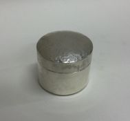 A heavy hammered effect silver snuff box with lift