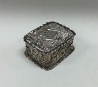 A chased silver hinged box. Birmingham. Approx. 15