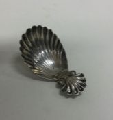 A George III silver caddy spoon with shell termina