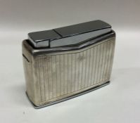 GEORG JENSEN: A very large Art Deco silver lighter