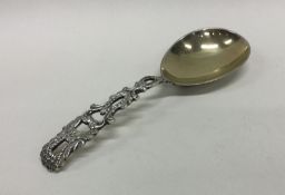 A heavy pierced Victorian silver caddy spoon. Lond