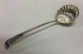 An18th Century silver sauce ladle with feather edg