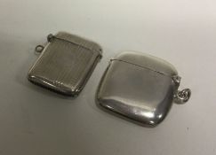 An engine turned silver vesta case together with a