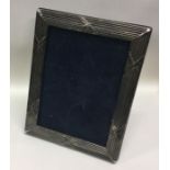 A large silver picture frame. London 2000. Est. £5