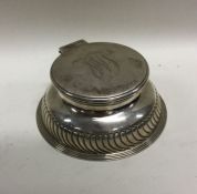 A Victorian silver and glass inkwell. London 1871.