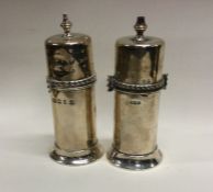 A pair of silver peppers. Birmingham. Approx. 130