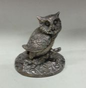 A heavy silver figure of an owl. Approx. 55 grams.