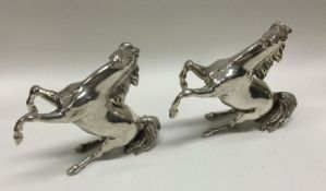 A heavy pair of Victorian cast silver figures of h