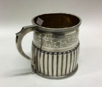 A finely engraved George III silver mug. London 17