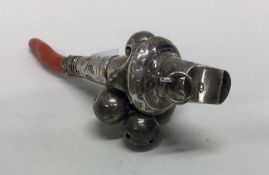 A fine George III silver and coral teething rattle