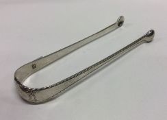 An 18th Century pair of silver ice / sugar tongs w