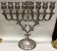 A large Judaica silver Menorah. Marked 925 Sterlin