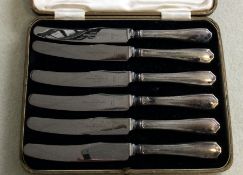 A boxed set of six silver handled tea knives. Shef