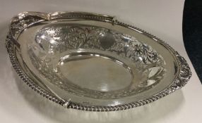 An attractive Edwardian silver pierced swing handl