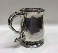 A George II silver baluster shaped mug. Approx. 18