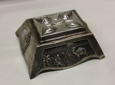 OF ROYAL INTEREST: A rare silver inkwell chased wi