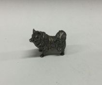 A heavy English silver figure of a poodle. Approx.